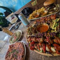 Burger & fries, artichoke dip & mixed grill at Koocha Mezze Bar in Bristol