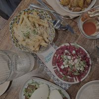 Bao buns, parmesan fries, salad, batata harra at Koocha Mezze Bar in Bristol