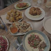 Loaded hummus, spiced cauliflower, mushroom wings, batata harra and roasted sweet potato at Koocha Mezze Bar in Bristol