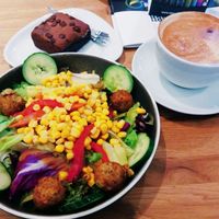 Falafel salad (small), cappuccino and vegan brownie at Mischbar in Nuremberg