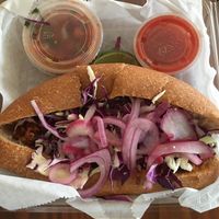 Soy torta (looks like eyes and a mouth saying “eat me, I’m plant-based” lol) at Guacamaya Oasis in Downey
