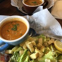 Vegan Caesar salad  and vegan legacy sandwich with vegan tomato & herb soup.  at The Board Room Cafe in Grand Forks