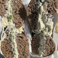 Vegan scallion on pumpernickel   at Westman's Bagel and Coffee in Seattle