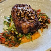 HASH: slab of vegetable hash, carrot puree, chimmichurri dressed salad, spiced seeds at Equium Social in Newcastle