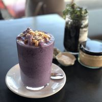 Blueberry smoothie made on almond milk at Equium Social in Newcastle