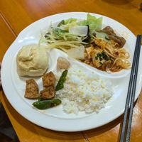 My first plate of food! Mapo tofu, layered bean curd, original bao, lots of veggies and potato at Leshan Giant Buddha 乐山素食餐厅 in Leshan