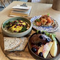 Breakfast platter: vegan çilbir, tomato focaccia and pancakes. Different from the Voorstraat one due to the silken tofu (instead of firm tofu) and different oils and spices at GYS - Amsterdamsestraatweg in Utrecht