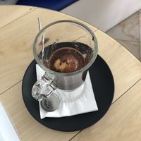 Vegan affogato with passion fruit sorbet and hot chocolate poured over (3.5€). at La Gelateria in Sao Miguel