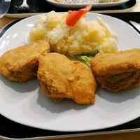 Spinach schnitzels with potato salad at Formosa Food in Vienna