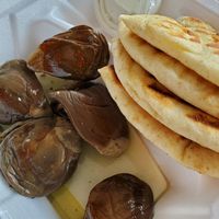 Makdous -- marinated baby eggplants stuffed with walnuts, garlic, and roasted red pepper served with a pita at OC Kabob in Ocean City