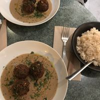 Delicious Bean balls in peanut butter sauce. With rice. at Table Metis in Paris
