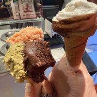 Medium size, you can choose 2 or 3 flavors. I go with pistachio, orange ginger, and dark chocolate. My partner go with pistachio, coco, and dark chocolate. Rich flavor  at Gelato San Lorenzo in Rome