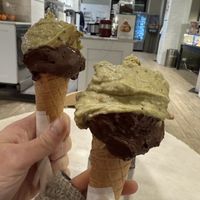 I go with pistachio and chocolate. So it is 1:1 ratio portion of 2 flavors. My partner goes with dark chocolate, pistachio, and dark chocolate layering. So it is 2:1 ratio.   at Gelato San Lorenzo in Rome