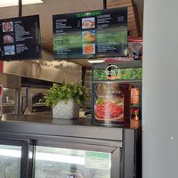 Cake fridge and vegan menu at Troy's Italian Kitchen in Arlington