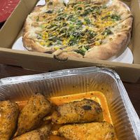 Elote pizza and buffalo wings   at Troy's Italian Kitchen in Arlington