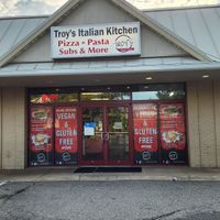 Proudly advertise vegan options at the storefront at Troy's Italian Kitchen in Arlington
