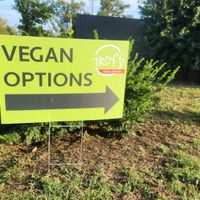 Sign out front announcing vegan options at Troy's Italian Kitchen in Arlington