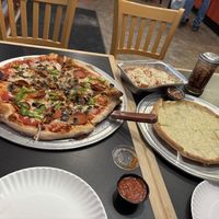Vegan pizza, chicken parm pasta, cheese bread   at Troy's Italian Kitchen in Arlington
