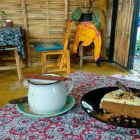 Masala chai with soymilk and carrot cake at Blossom Cafe in Pai