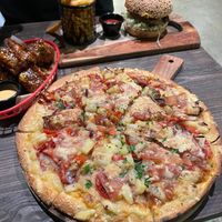 Hawaiian pizza, cauliflower wings, burgers and fries at Gorilla Kitchen in Auckland