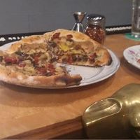 Vegan Delight pizza is still available later in the evening, the sun-dried tomatoes and almond "cheese" were amazing! Great beer. Cool spot. at Forager Brewery in Rochester