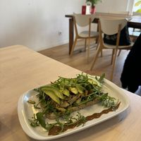 Gf toast with avocadoo  at Roots Cafe in Cascais