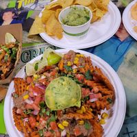 Sweet potato nachos and chips & guac at Rad Dads Tacos and Tequila Bar in Muskegon