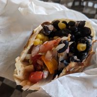 Burrito with black beans and fajita veggies at Amigo Daily Burrito  in Mackinac Island