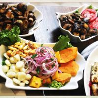 Mango ceviche and Peruvian potatoes with sautéed mushrooms  at Samadhi Veggie Food in Lima