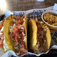 Refried bean tacos, no cheese, and vegan rice  at Taco Bus in Clearwater