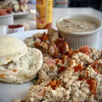 Tofu scramble w/ roasted potatoes, biscuit and vegan gravy    at Beans and Barley Market & Cafe in Milwaukee