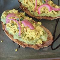 Smashed avocado toast with scrambled tofu at Meraki Market Cafe in Paphos