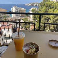 Orange juice + vegan yogurt bowl  at Avocado Mallorca in Mallorca