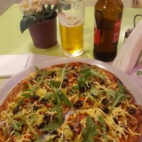 So-so pizza with vegan cheese at Point Cafe in Mykonos