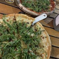 Verde pizza & pugliese (in the back) both vegan  at Little Wing Pizzeria in Belfast