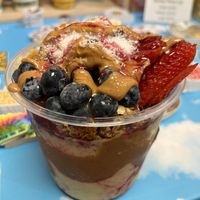 Tropical smoothie bowl with extra blueberries, strawberries and peanut butter   at The Sunrise Shack - Honolulu in Honolulu