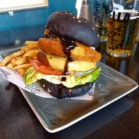 Iconic black bun syko burger at Church - Temple of Fun in Sheffield