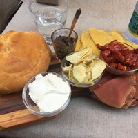 Vegan cold cuts and cream cheese at Pan8 in Bologna