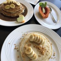 The bottom right pancakes were vegan! The top left were my husbands regular pancakes they had! The papaya was fresh as well! at Ami Ami in Kihei