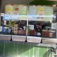 Outdoor Menu - with lots of vegan/plant-based signage 😌  at TNK Vegan Cafe in Modesto