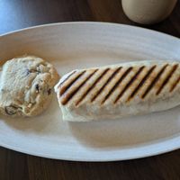 Tex Mex Wrap and vegan chocolate chip cookie at NovelTea Coffeehouse & Bakery in Truro