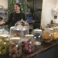 Feast staff cheery in financial exchanges surrounded by fine delicacies at Feast in Geelong