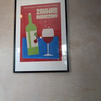 Big poster saying it's not wine, it's red beet leavener 😂 at Naturalna in Bydgoszcz