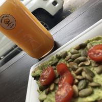 Cold pressed Feel Better juice and farmers choice avocado toast  at Tree of Life Juice in Saugatuck