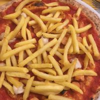 Vegan pizza w cheese vwurstel and fries at Al Carmine in Padua