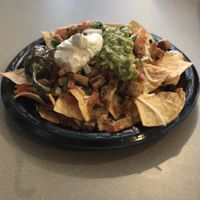 Not-chos: Chik-N, began shredded cheese, vegan sour cream, pico de Gallo, salsa at Guapo's Taco Shop in Bakersfield