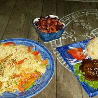 Udon noodles, salad and seitan steak with rice at cHelloVegi in Kampot