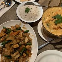 Calamari stir fry, mock duck red curry & coconut rice  at A Taste of Siam in Hampton