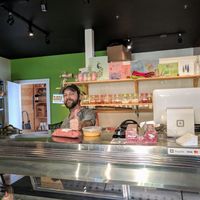 Jim behind the counter   at 7 Sprouts in Powell River
