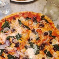 Caramelised onion and spinach pizza at Pizza Express in Renfrew